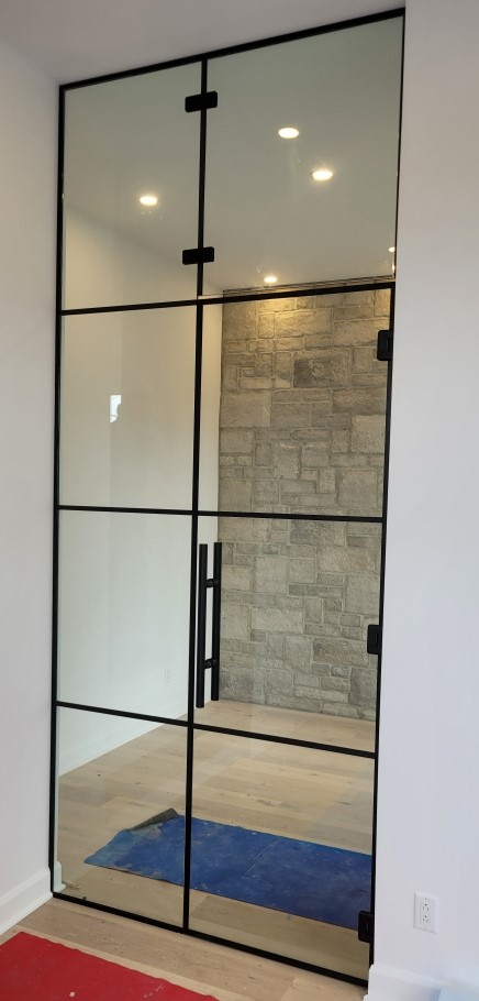 Division avec porte en verre